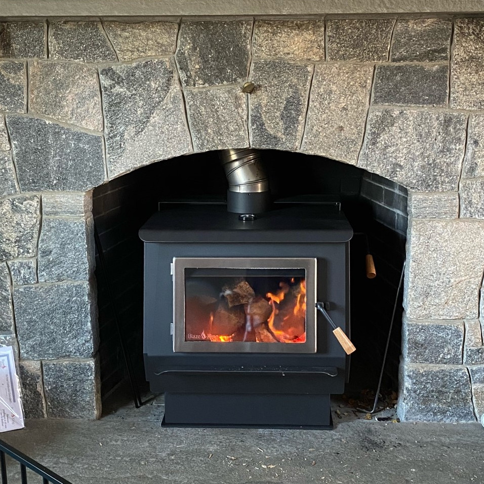 Wood Stove In Fireplace