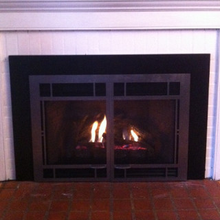 Custom propane gas fireplace log insert.